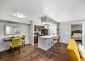 Thumbnail 23 of 37 - our apartments offer a living room with a kitchen and dining area