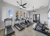 Thumbnail 21 of 37 - the preserve at ballantyne commons fitness room with treadmills