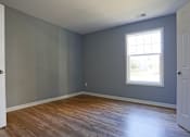 Thumbnail 20 of 21 - an empty bedroom with big window