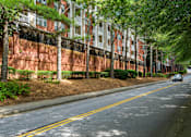 Thumbnail 29 of 80 - A car is parked on the side of a street.