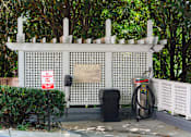 Thumbnail 63 of 80 - A car care center with a no parking sign in front.