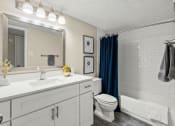 Thumbnail 12 of 20 - a bathroom with a large mirror and a sink and a toilet at Keller Oaks, Texas ?