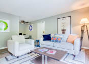 Thumbnail 8 of 32 - a living room with two couches and a coffee table at The Grove Brentwood, Tennessee ?