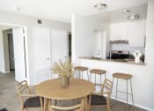 Thumbnail 2 of 22 - dinning room seating with view into the kitchen