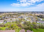 Thumbnail 16 of 16 - an aerial view of a neighborhood with houses and lawns at The Hudson, Carrollton, 75006 