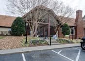 Thumbnail 5 of 32 - the front of a brick building with stairs and a sidewalk at The Grove Brentwood, Nashville, TN ?