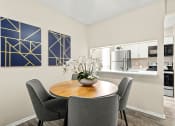Thumbnail 6 of 20 - a dining room with a table and chairs and a kitchen at Keller Oaks, Carrollton ?