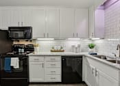 Thumbnail 5 of 27 - Kitchen with cabinets at The Brentwood, Nashville, TN