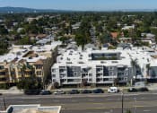 Thumbnail 21 of 22 - an aerial view of a large building on a city street