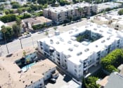 Thumbnail 22 of 22 - an aerial view of an apartment building in a city