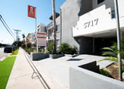 Thumbnail 16 of 22 - the building in which the motel is located is on the side of the street