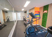 Thumbnail 7 of 22 - fitness center with cardio equipment