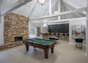 Thumbnail 29 of 32 - A room with a pool table and a fireplace. at The Grove Brentwood, Nashville, TN 37211 