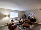 Thumbnail 30 of 32 - A living room with a white couch and a lamp. at The Grove Brentwood, Nashville, TN 37211 