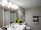Thumbnail 15 of 32 - A bathroom with a white sink and a mirror above it. at The Grove Brentwood, Nashville, TN 37211 