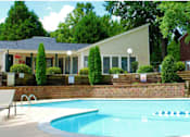 Thumbnail 11 of 21 - a swimming pool in front of a house