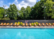 Thumbnail 20 of 30 - Pool and pool chairs at Collier Ridge Apartments in Atlanta