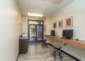 Thumbnail 4 of 23 - business center with two computers and seating at Radbourne Lake Apartments, Charlotte ?
