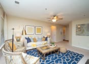 Thumbnail 16 of 23 - a living room with a couch and a coffee table at Radbourne Lake Apartments, Charlotte, 28269 ?