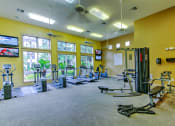 Thumbnail 2 of 20 - the fitness center at the village at sunburst park apartments ga at Stone Creek at Old Farm Apartments, Texas 77063