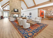 Thumbnail 15 of 43 - a large living room with a fireplace and a rug