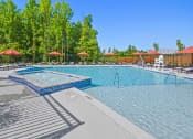 Thumbnail 37 of 43 - the reserve at city center amenities include a pool and spa with umbrellas