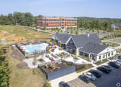 Thumbnail 43 of 43 - an aerial view of a resort with a swimming pool    and a building