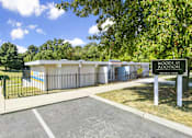 Thumbnail 11 of 18 - A private pool is located at Woods at Addison.
