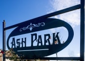 Thumbnail 17 of 22 - a sign that says ask park in front of a building