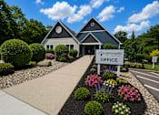 Thumbnail 1 of 26 - The Orchard of Landen office is surrounded by a well-manicured garden.
