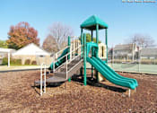 Thumbnail 14 of 15 - a playground with a slide and