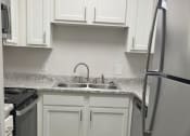 Thumbnail 7 of 25 - Reno Kitchen