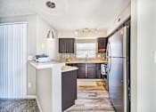 Thumbnail 14 of 26 - Kitchen with premium cabinet  and stainless appliances