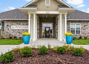 Thumbnail 22 of 23 - The front of a building with the name Aventura at St. Peters on it.