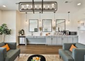 Thumbnail 22 of 28 - a living room with couches and a coffee table at Aventura at Hawk Ridge, Lake St Louis