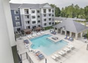 Thumbnail 12 of 29 - Pool w/ Expansive Sundeck at Aventura at Wild Horse Creek, Chesterfield, 63017