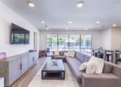 Thumbnail 5 of 37 - a living room with a couch and a coffee table at Aventura at Towne Centre, Missouri, 63011
