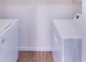Thumbnail 26 of 37 - a washer and dryer in a room with white walls at Aventura at Towne Centre, Ellisville, MO, 63011