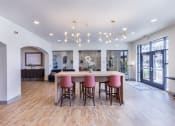 Thumbnail 6 of 29 - a dining room with a large table and chairs at Aventura at Wild Horse Creek, Missouri, 63017