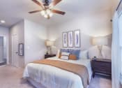 Thumbnail 24 of 29 - a bedroom with a large bed and a ceiling fan at Aventura at Wild Horse Creek, Chesterfield, MO, 63017