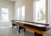 Thumbnail 16 of 37 - a game room with a foosball table at The Edison at Blue Springs, Missouri, 64014