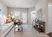 Thumbnail 6 of 41 - Living Room with Patio Door at Aventura at Wentzville I & II Apartments, Wentzville, 63385