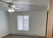 Thumbnail 7 of 10 - Bedroom with Window and Ceiling Fan