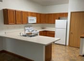 Thumbnail 5 of 10 - Large Kitchen with Breakfast Bar