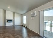 Thumbnail 24 of 41 - Open Concept Living Area with Fireplace
