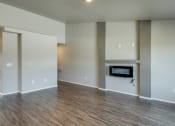 Thumbnail 25 of 41 - Open Concept Living Area with Fireplace