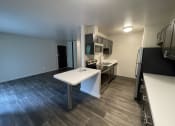 Thumbnail 5 of 22 - Renovated Kitchen and Living Space