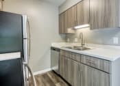 Thumbnail 5 of 25 - boerma renovated kitchen gray cabinets white countertops