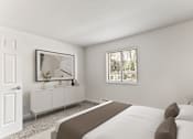 Thumbnail 5 of 22 - A bedroom with a large bed and a white cabinet with a mirror above it.