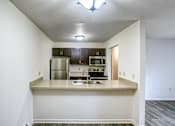 Thumbnail 15 of 22 - Stool Bar and kitchen